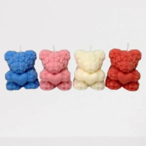 Teddy bear holding heart Candle